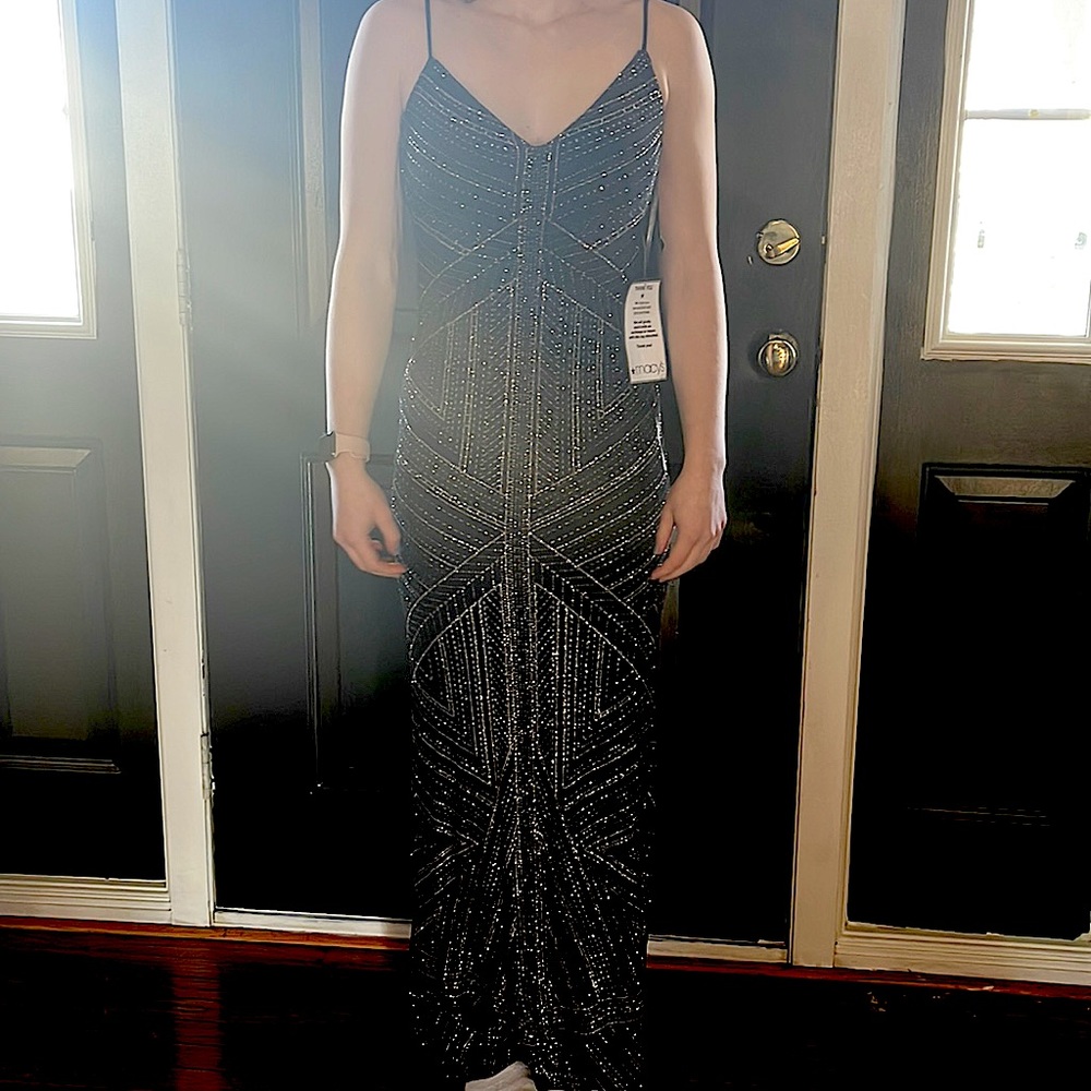 Formal black and gold beaded long gown. NWT.